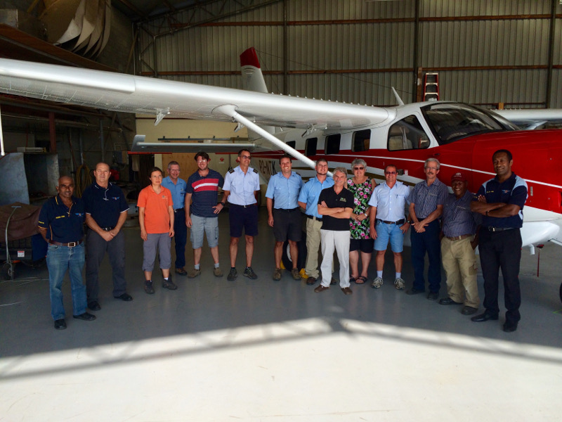 This is the NTMA-PNG team - finally finished with the inspection, and ready to begin serving with this newly-approved airplane!